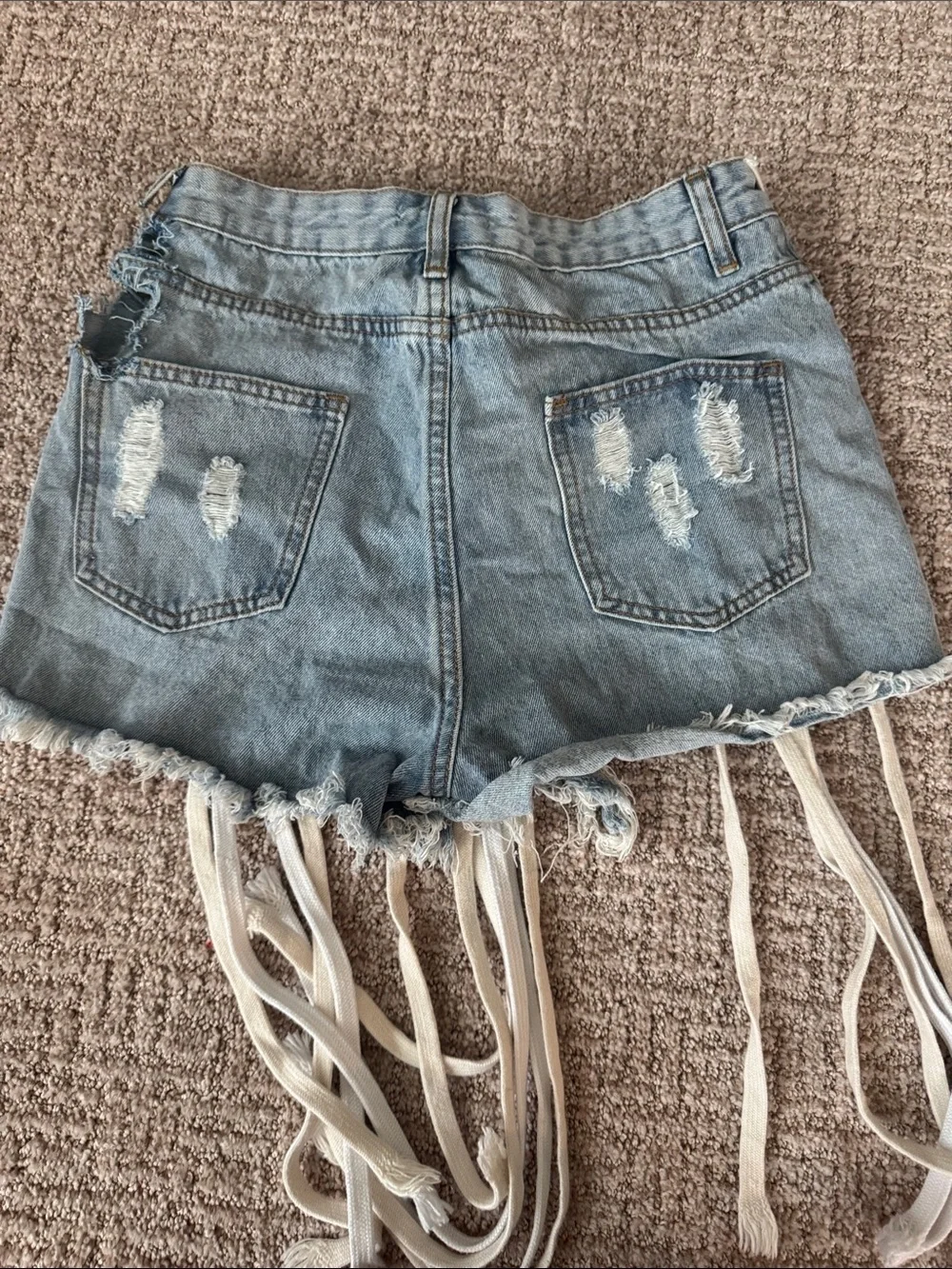 Distressed Light Blue Denim Shoe Lace Grommet Fringe Shorts